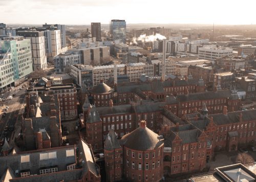a drone shot of Liverpool with a range of buildings across the city.